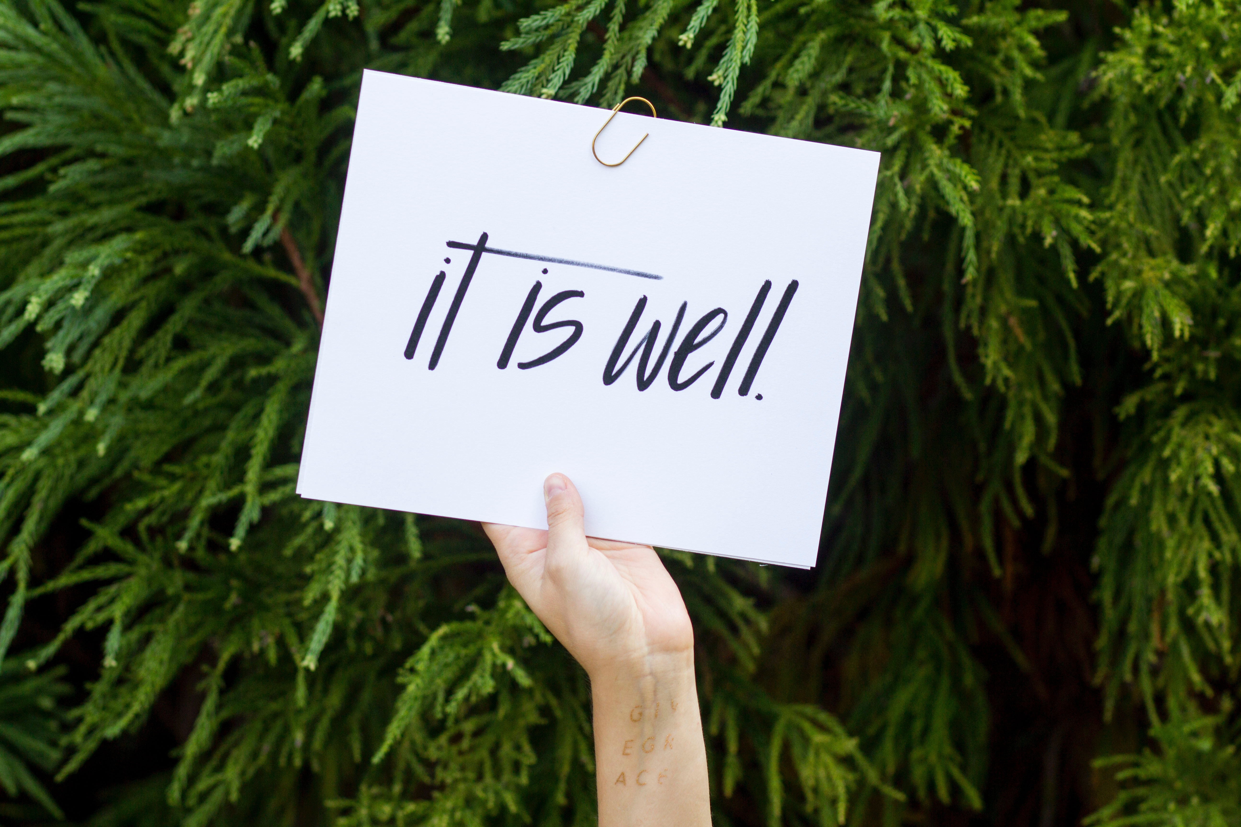 sign saying "it is well"